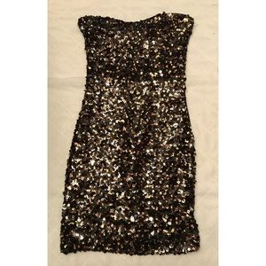 Sexy little black and gold Sequin dress